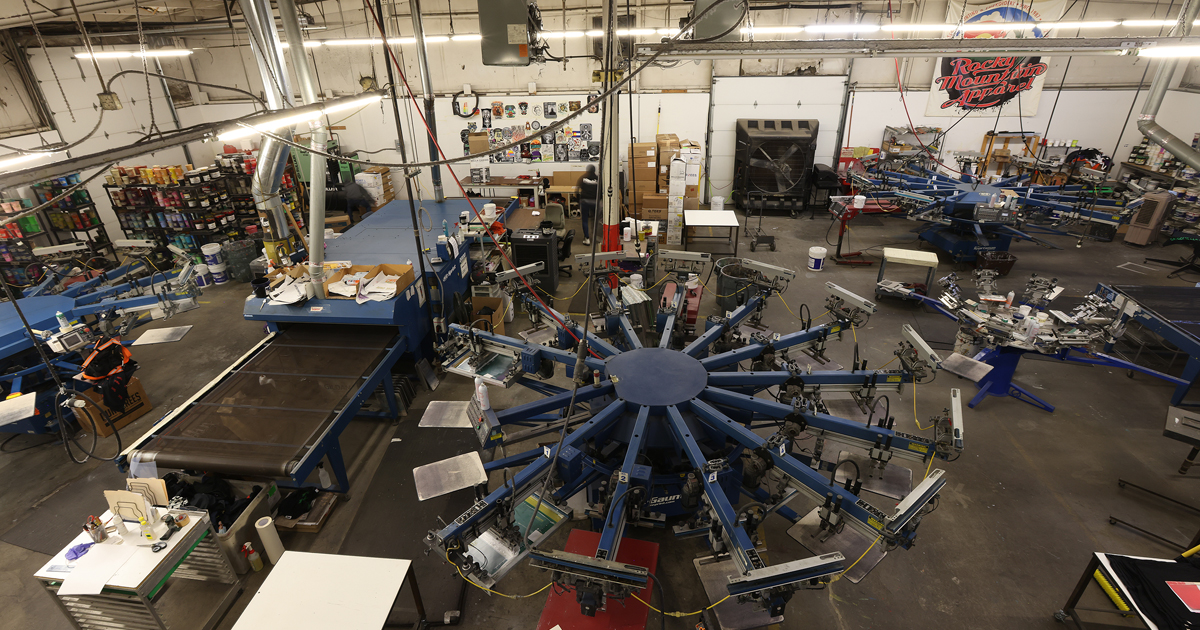 Rocky Mountain Apparel production floor with screen printing equipment